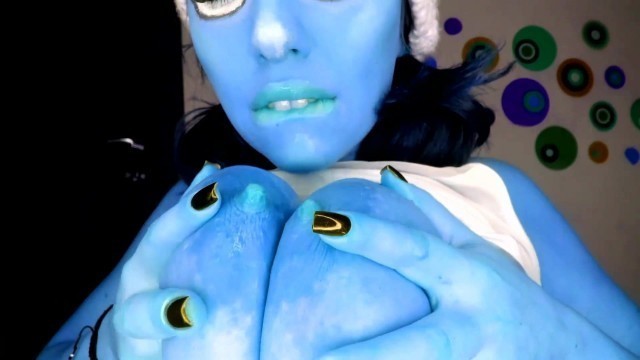 Busty Smurfette sucks and licks her eret blue nipples