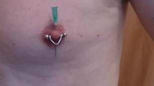 demo needles crossing nipples pierced
