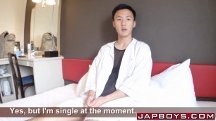 Cute Oriental twink tugging his rock solid cock and cumming